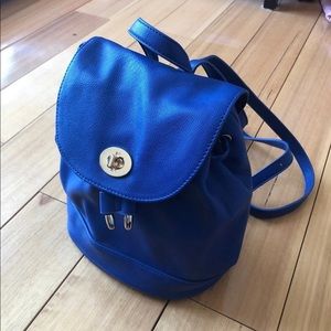 vibrant blue vegan leather backpack